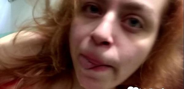 Amateur redhead takes a pecker on camera